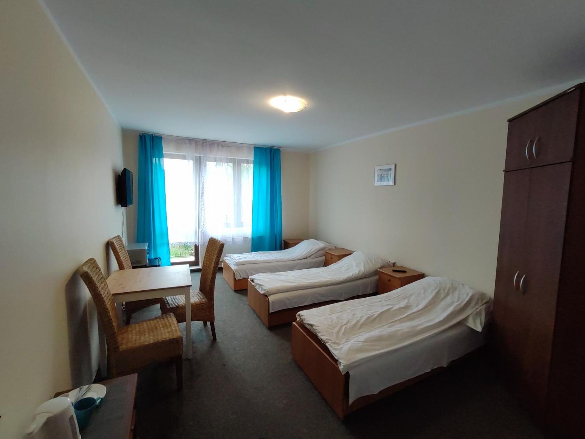 Apartamento Pokoje Luiza Ostróda Habitación foto